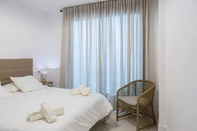 Cama o camas de una habitación en Royar Apartamentos