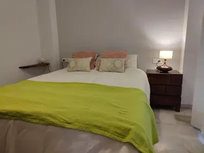 Cama o camas de una habitación en Luminoso Apartamento Exterior en el Centro con Balcón y Patio