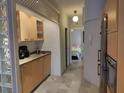 Una cocina o zona de cocina en Luminoso Apartamento Exterior en el Centro con Balcón y Patio