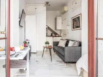 Zona de estar de Bonito estudio en calle Fería