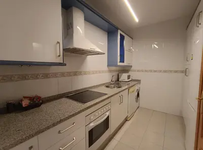 Una cocina o zona de cocina en SunShine Fernando Colon
