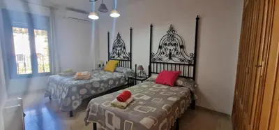 Cama o camas de una habitación en Juderia House in Cordoba