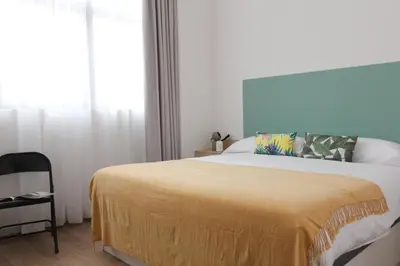 Cama o camas de una habitación en MonKeys Apartments Miraflores