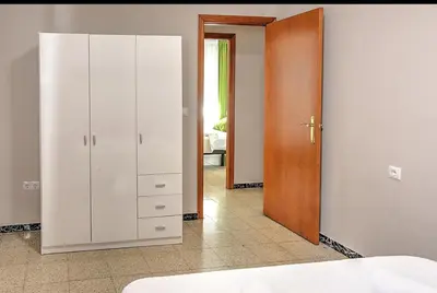 Cama o camas de una habitación en Ritual Sevilla, piedra preciosa