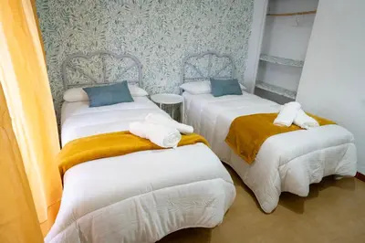 Cama o camas de una habitación en CASA MARÍA LA ROMANA