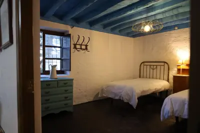 Cama o camas de una habitación en Casa Rural El Ayozar