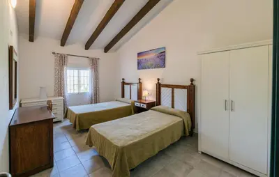 Cama o camas de una habitación en Nice Home In La Puebla De Los Infan