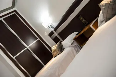 Cama o camas de una habitación en HOSTAL LAS PALOMAS