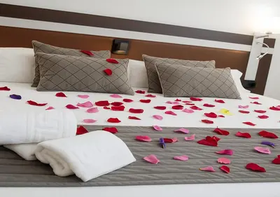 Cama o camas de una habitación en HOSTAL LAS PALOMAS