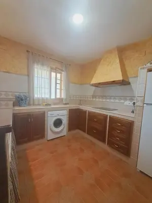 Una cocina o zona de cocina en casa rural Hachuelo