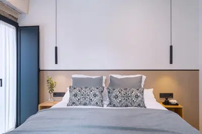 Cama o camas de una habitación en Luxury Apartment overlooking Casa Pilatos