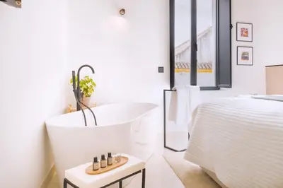 Cama o camas de una habitación en Luxurious Duplex - buthtub - 1Bd 1Bth Casa Pilatos