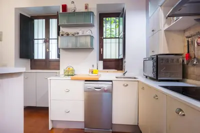 Una cocina o zona de cocina en Plaza San Marcos Apartment
