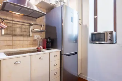 Una cocina o zona de cocina en Plaza San Marcos Apartment