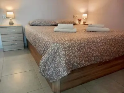 Cama o camas de una habitación en Nervion Plaza Dodo Apartment