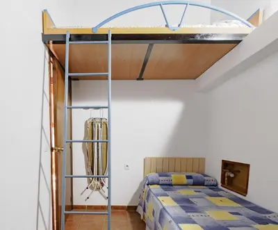 Cama o camas de una habitación en Cubo's Casa Rural Jose & Caminito del Rey
