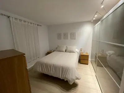 Cama o camas de una habitación en Mini loft con patio en la Alameda de Sevilla