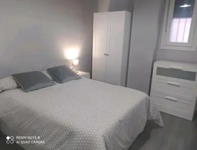 Cama o camas de una habitación en Estudio Palacio Congresos Aeropuerto