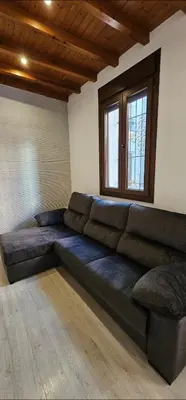 Zona de estar de Relator Suites