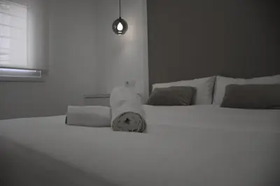 Cama o camas de una habitación en Casa Mallen, con amplia terraza, en el barrio de Nervión