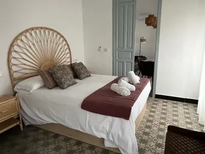 Cama o camas de una habitación en La Llave de la Corredera