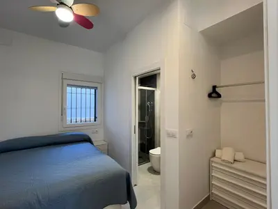 Cama o camas de una habitación en Baeza aloja cuenta con servicios a 1 y 5 minutos