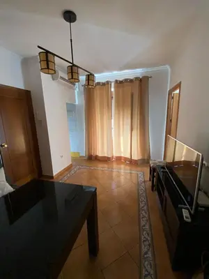 Una televisión o centro de entretenimiento en Apartamento Puerta del Perdón