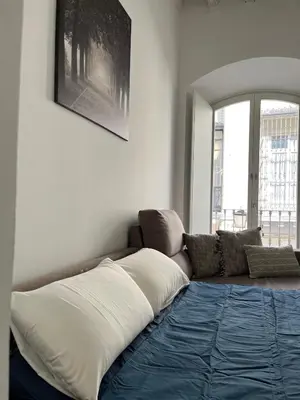 Cama o camas de una habitación en Balcones de Jauregui Premium Apartment