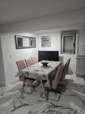 Una televisión o centro de entretenimiento en LOS MELLIS