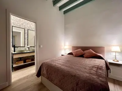 Cama o camas de una habitación en Auxiliadora Luxury
