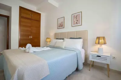 Cama o camas de una habitación en Prada Suite Home