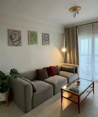 Zona de estar de Cozy apartment next to center