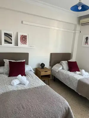 Cama o camas de una habitación en Cozy apartment next to center
