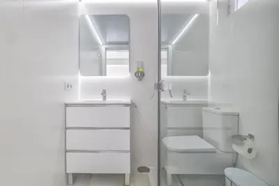 Un baño de Apartamentos Haranas II & Parking