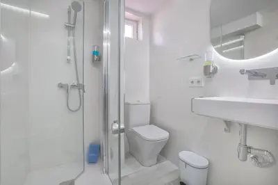 Un baño de Apartamentos Haranas II & Parking
