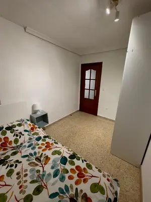 Cama o camas de una habitación en Apartamento en Sevilla