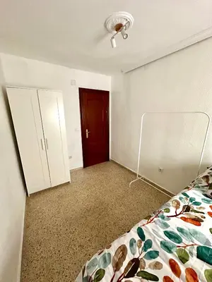 Cama o camas de una habitación en Apartamento en Sevilla