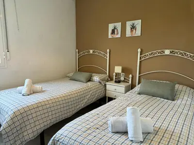Cama o camas de una habitación en Apartamento Gran Vía Parque 7