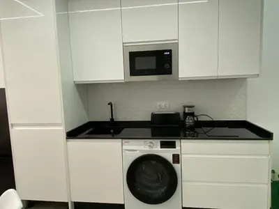 Una cocina o zona de cocina en Alba Home , junto al estadio fútbol y Ribera