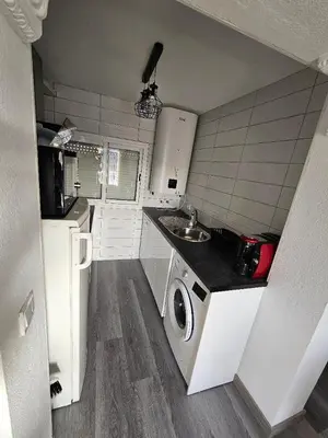 Una cocina o zona de cocina en Piso Ana appartement Cosy et moderne, Climatisé été, hiver