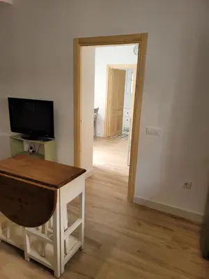 Una televisión o centro de entretenimiento en Apartamento con WiFi y aparcamiento privado