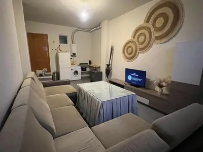 Una televisión o centro de entretenimiento en Casa Rural Las Eras de Campotejar
