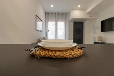 Una televisión o centro de entretenimiento en Loft Toñi Home