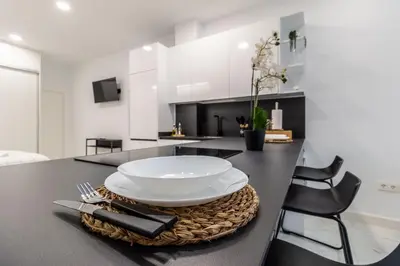 Una televisión o centro de entretenimiento en Loft Toñi Home