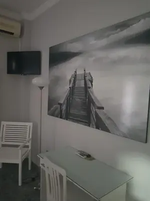 Una televisión o centro de entretenimiento en Hostal Hispalis