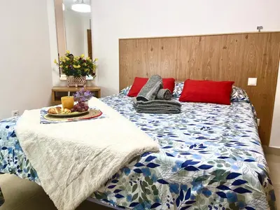 Cama o camas de una habitación en Catedral del AOVE, centro histórico, espacioso y tranquilo