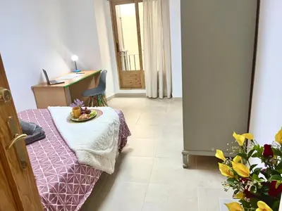 Cama o camas de una habitación en Catedral del AOVE, centro histórico, espacioso y tranquilo
