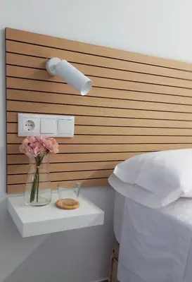 Cama o camas de una habitación en La Alcoba