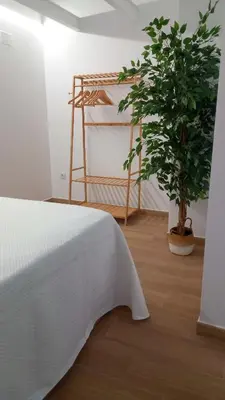 Cama o camas de una habitación en La Alcoba