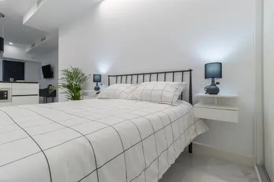 Cama o camas de una habitación en Loft Miguel Angel Home